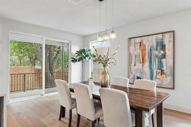 dining room featuring light hardwood / wood-style floors