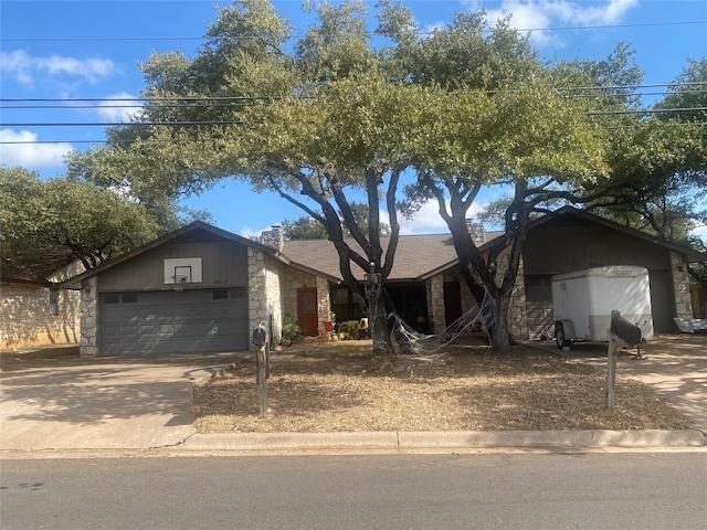 single story home featuring a garage