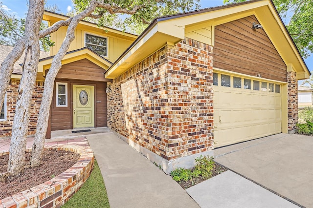 entrance to property featuring a garage