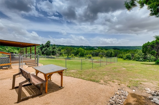 view of yard featuring a patio and a rural view