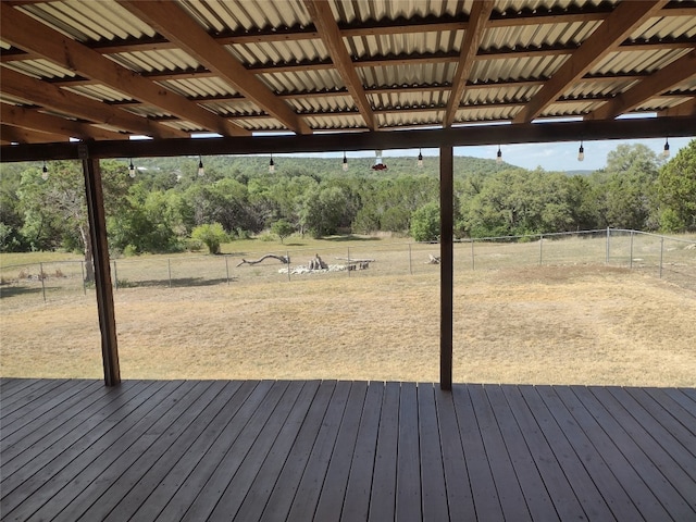 wooden terrace with a rural view