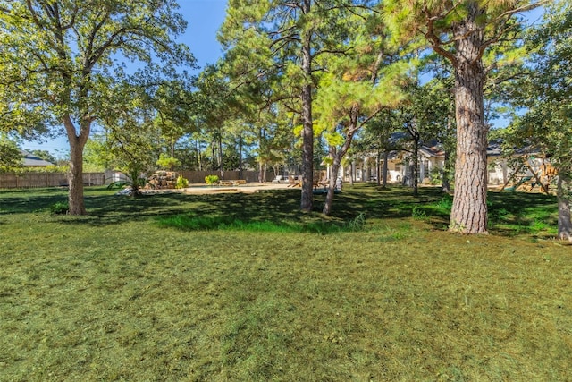 view of yard with fence