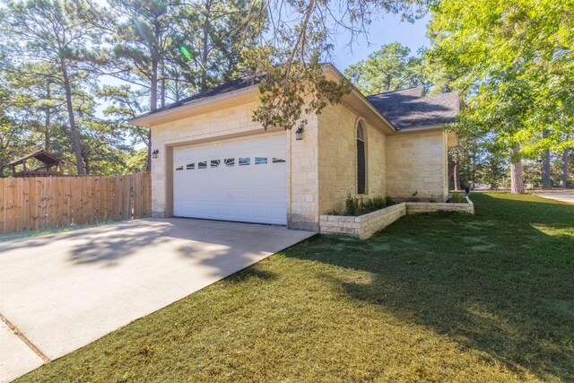 view of property exterior with a lawn and a garage