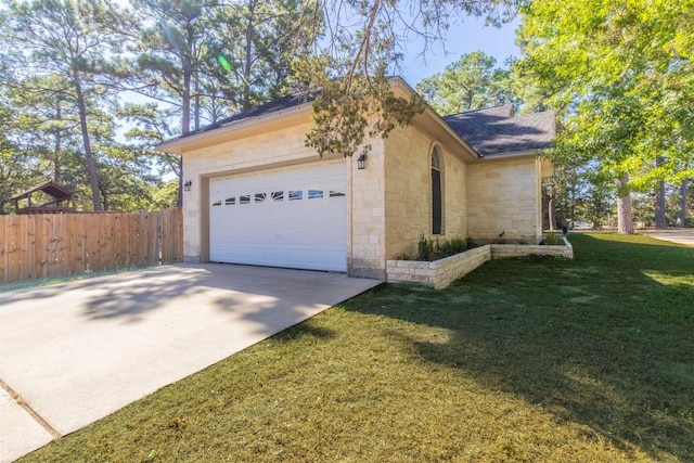 view of property exterior with a lawn, stone siding, fence, concrete driveway, and a garage