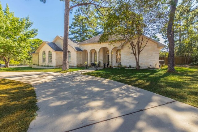 view of front of home with a front yard