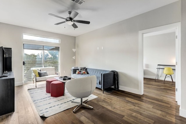 office with ceiling fan and dark wood-type flooring