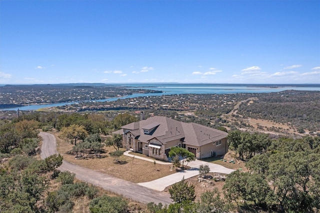 drone / aerial view featuring a water view