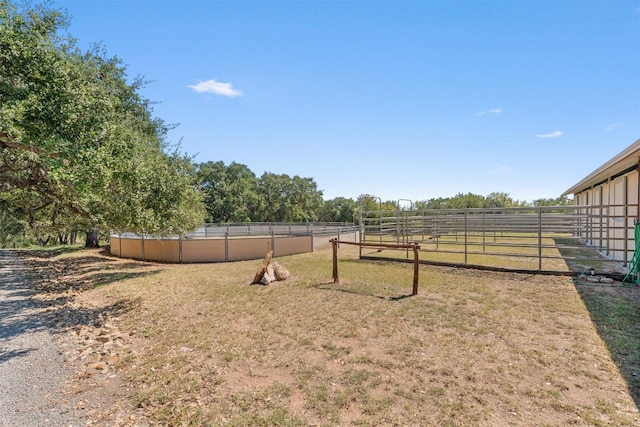 view of yard with a rural view