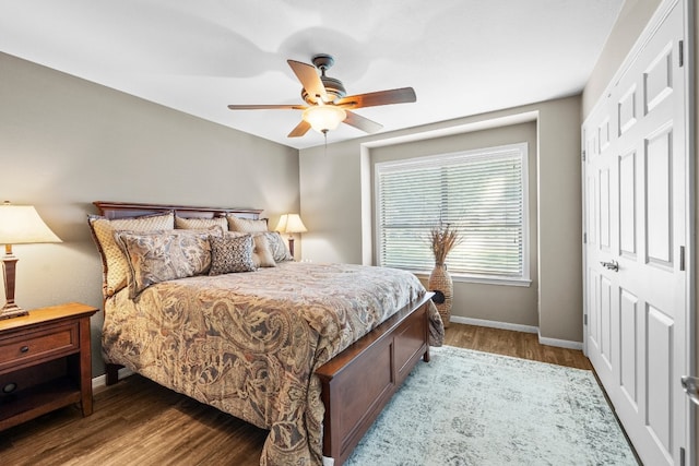 bedroom featuring a closet, ceiling fan, and hardwood / wood-style floors