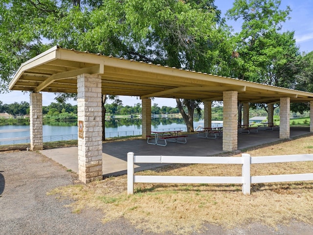 view of community with a water view