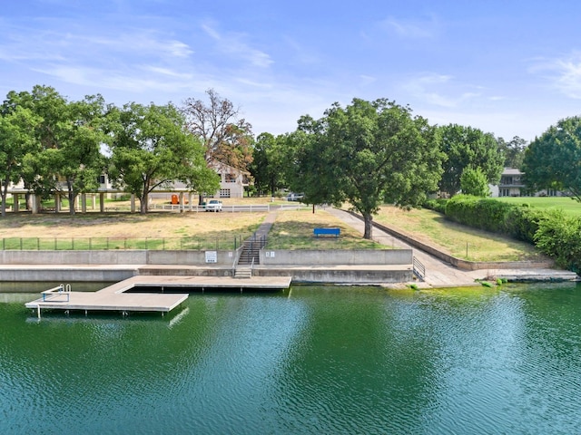 dock area with a water view