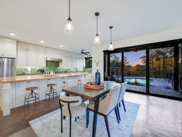 dining space with ceiling fan