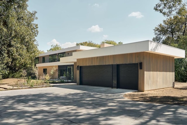 contemporary home with a garage