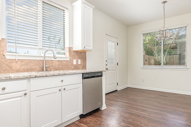 kitchen featuring dishwasher, dark hardwood / wood-style flooring, decorative light fixtures, and white cabinets