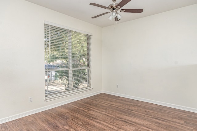 unfurnished room with hardwood / wood-style floors and plenty of natural light