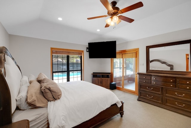 bedroom with light carpet, vaulted ceiling, ceiling fan, and access to exterior