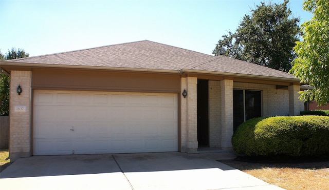 ranch-style home with a garage