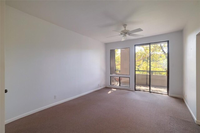 1707 Spyglass Dr Unit 57, Austin, TX 78746 - carpeted spare room with ceiling fan and baseboards