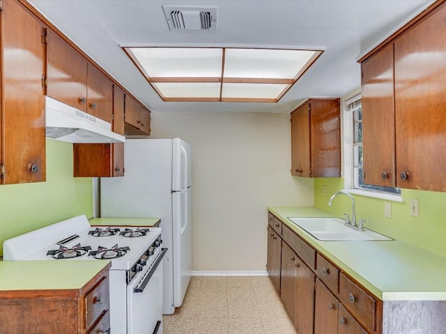 kitchen featuring gas range gas stove and sink