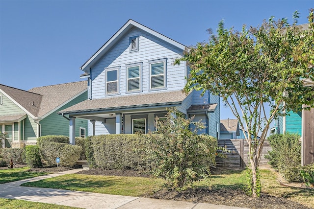 view of front of property featuring covered porch