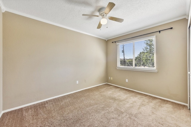 unfurnished room with light carpet, ceiling fan, and a textured ceiling