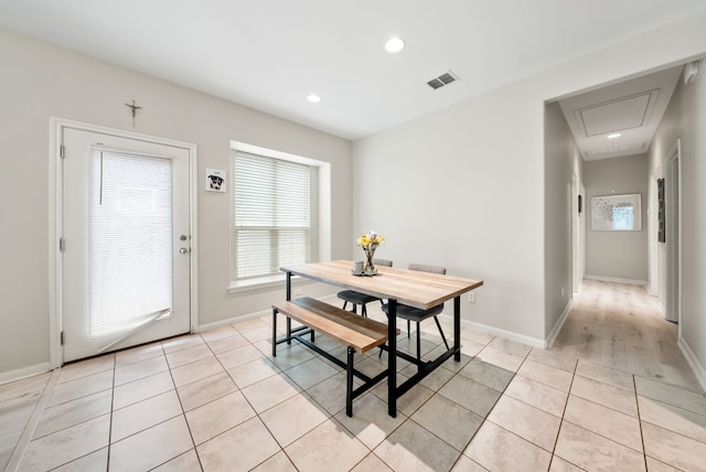 dining space featuring light hardwood / wood-style flooring