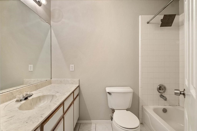 full bathroom featuring toilet, tiled shower / bath, and vanity