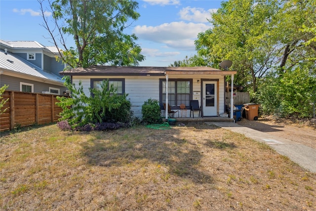 exterior space with a front lawn