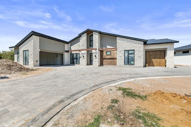 view of front of home featuring a garage