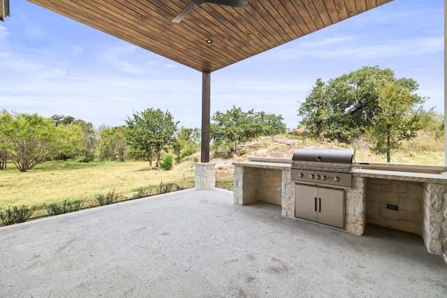 view of patio with exterior kitchen and grilling area