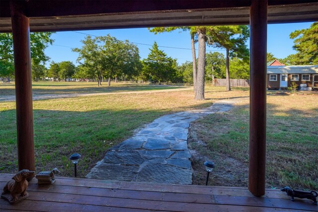 view of yard featuring a wooden deck