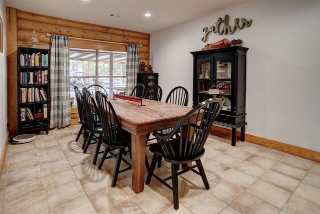 dining space with light tile patterned floors