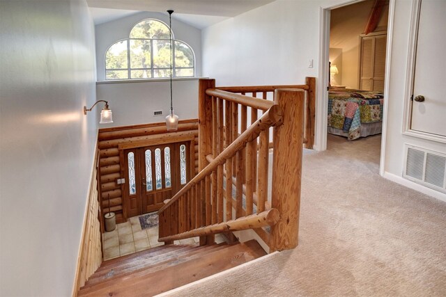 stairway with carpet flooring