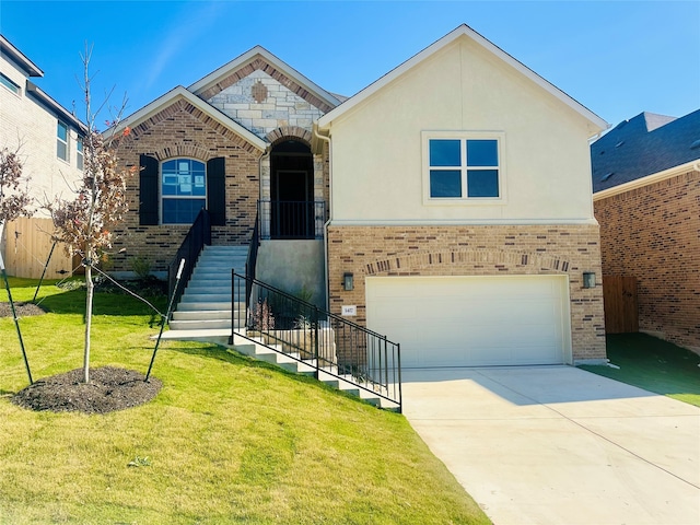 view of front of home featuring a garage and a front lawn