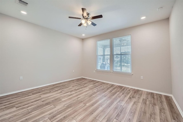 unfurnished room with light hardwood / wood-style floors and ceiling fan