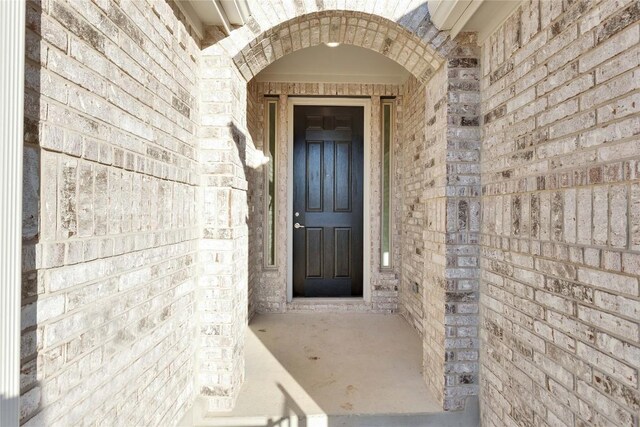 1429 Cole Estates Dr, Georgetown, TX 78628 - doorway to property with brick siding