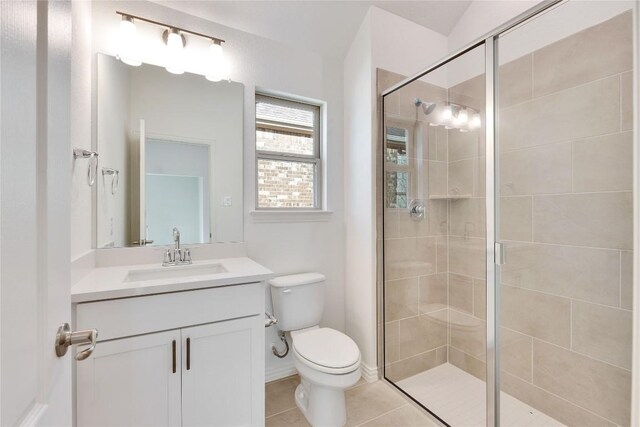 1429 Cole Estates Dr, Georgetown, TX 78628 - full bath with toilet, a stall shower, vanity, and tile patterned flooring