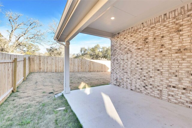 1429 Cole Estates Dr, Georgetown, TX 78628 - fenced backyard with a patio area