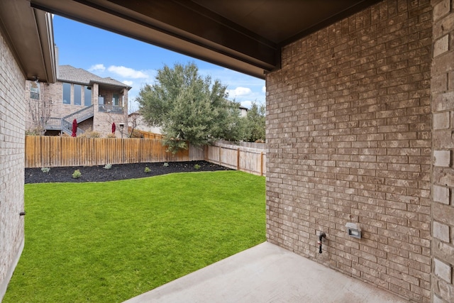 view of yard with a patio area