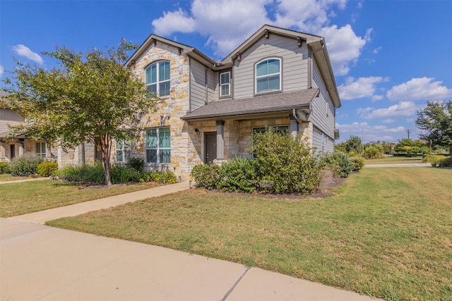 view of front of house with a front lawn