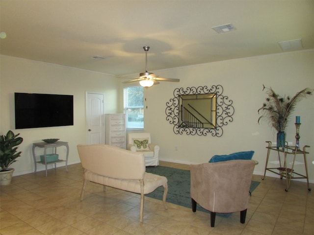 living room with light tile patterned floors and ceiling fan