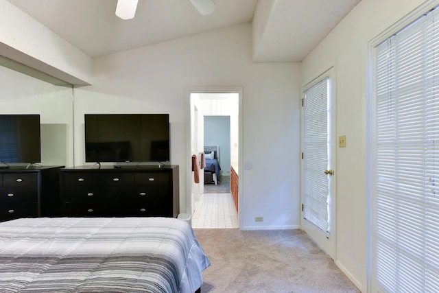 carpeted bedroom with lofted ceiling and ceiling fan