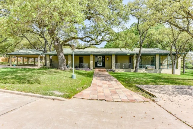 ranch-style house with a front lawn