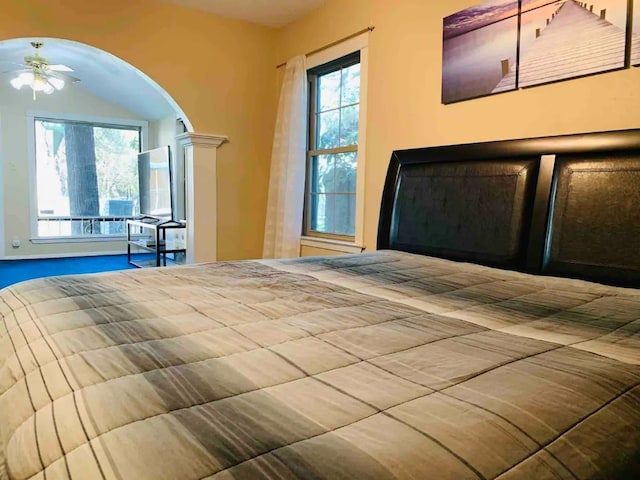 unfurnished bedroom featuring ornate columns