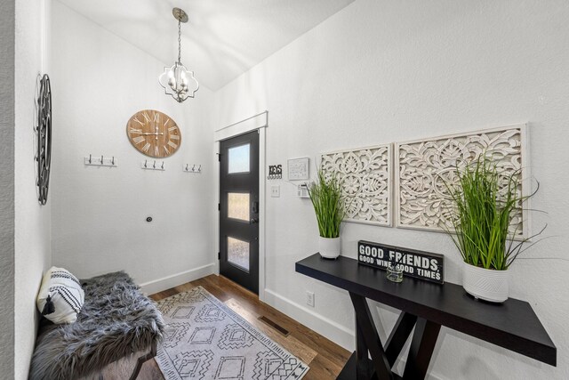 foyer entrance with hardwood / wood-style flooring