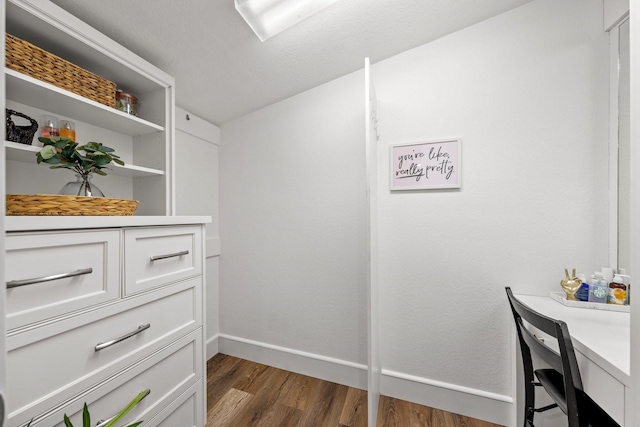 interior space with dark hardwood / wood-style flooring