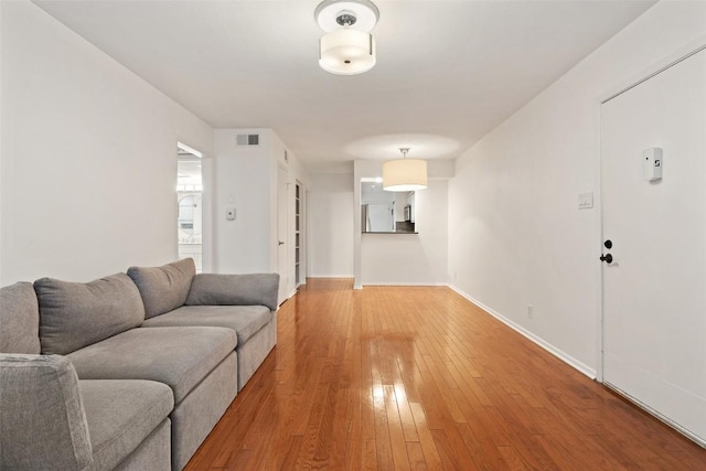 living room with hardwood / wood-style floors