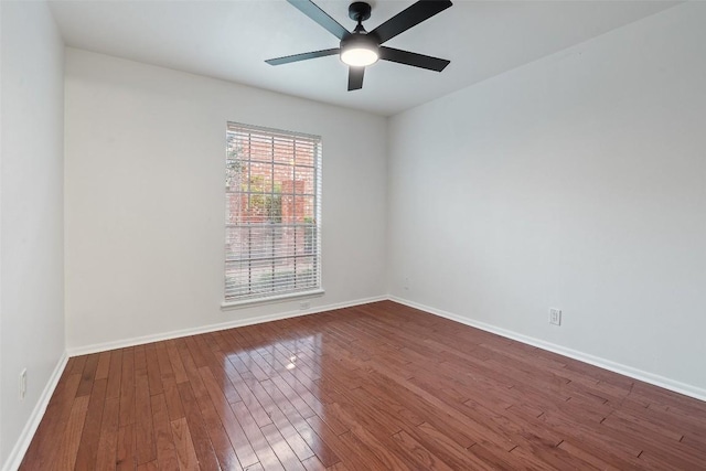 empty room featuring ceiling fan and wood-type flooring