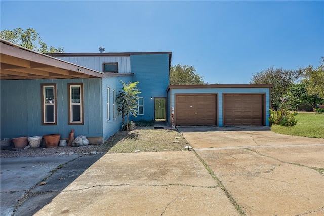 exterior space featuring a garage