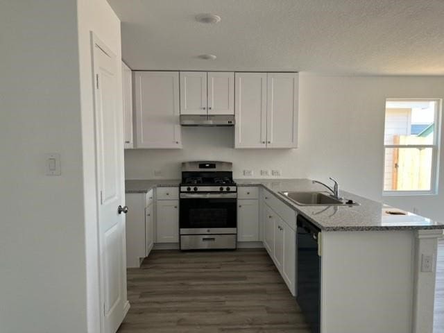 kitchen with white cabinetry, black dishwasher, dark hardwood / wood-style flooring, stainless steel stove, and sink